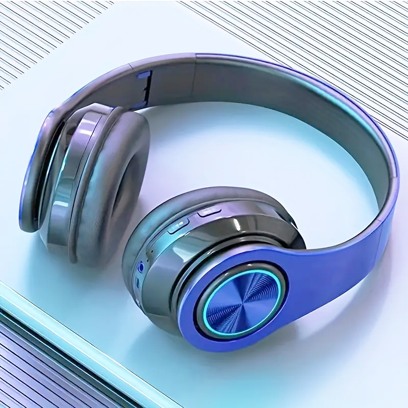 Luminous wireless headphones with LED lighting, wired and wireless functionality, and built-in microphone for communication and study.