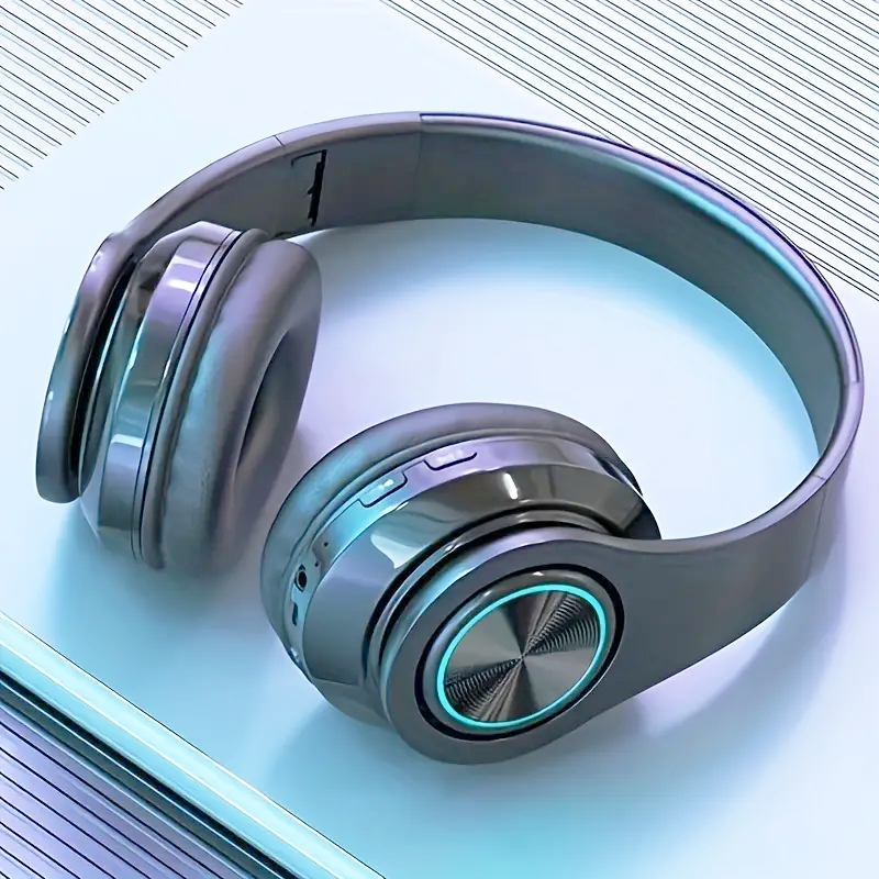 Luminous wireless headphones with LED lighting, wired and wireless functionality, and built-in microphone for communication and study.