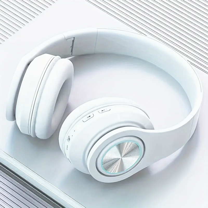 Luminous wireless headphones with LED lighting, wired and wireless functionality, and built-in microphone for communication and study.